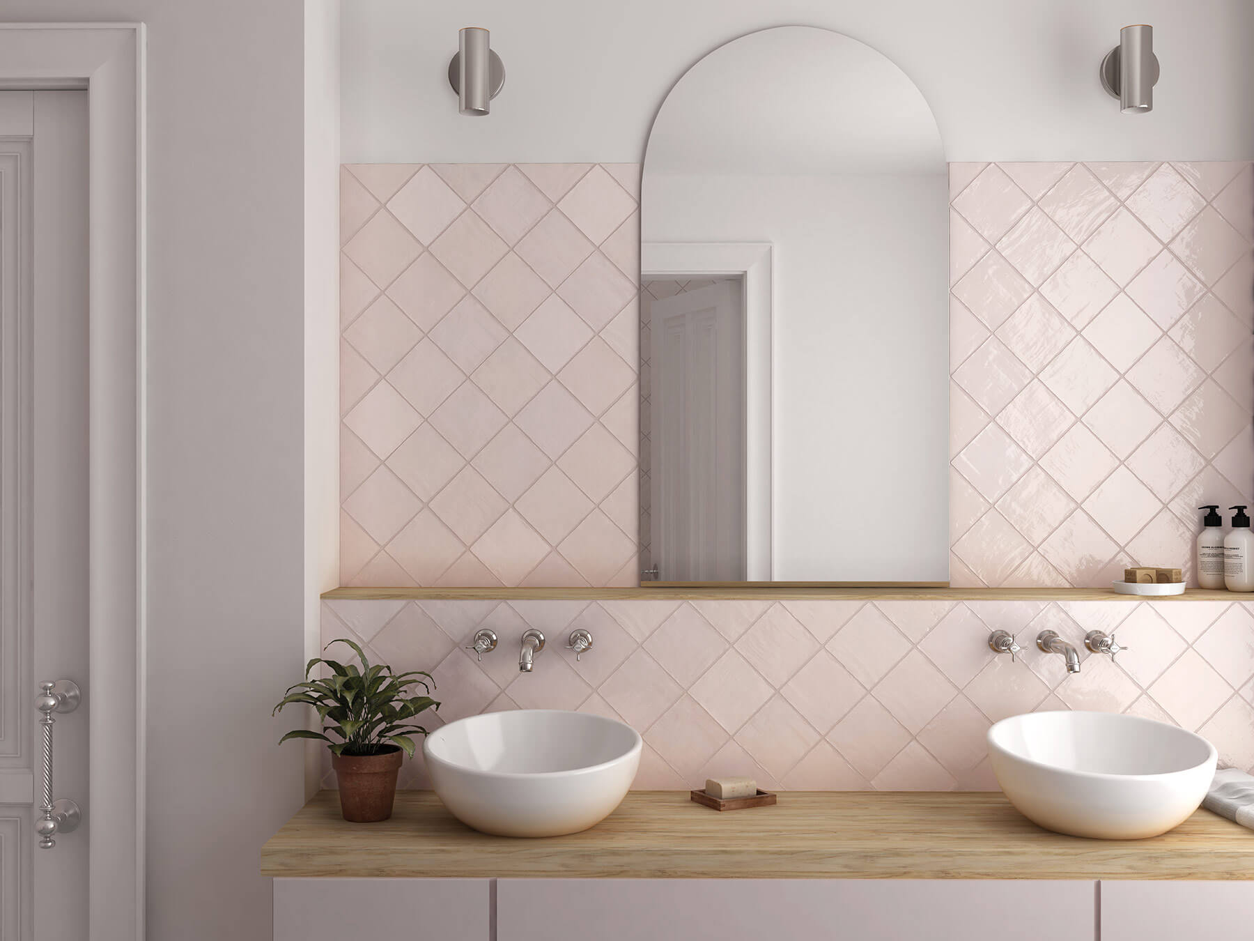 Modern bathroom with pink vanity, timber bench, white sinks and diagonal pink tiles as the splashback