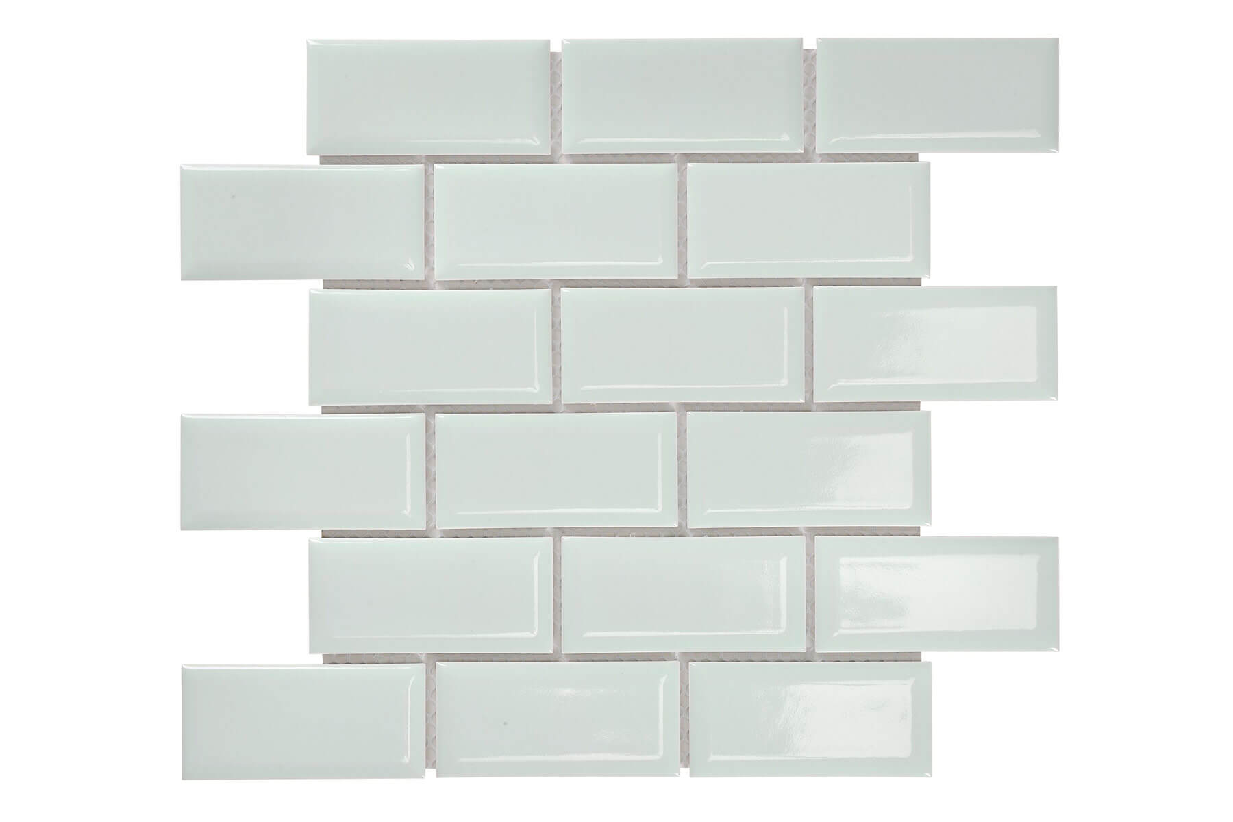 Panel of glossy green subway tiles.