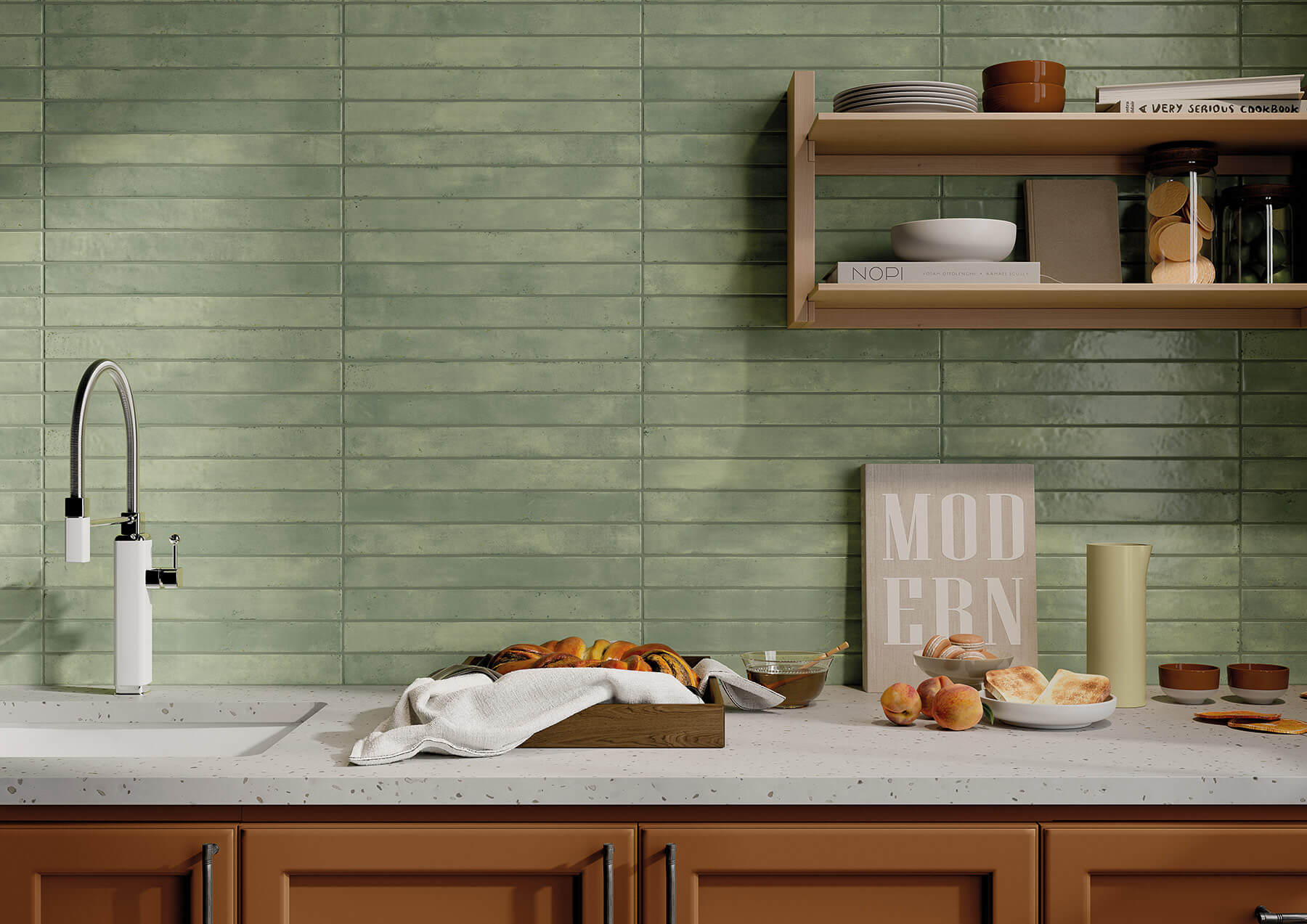 Kitchen with sage green subway tiles as a feature wall. They are laid horizontally. Timber cabinets and stone benchtop.