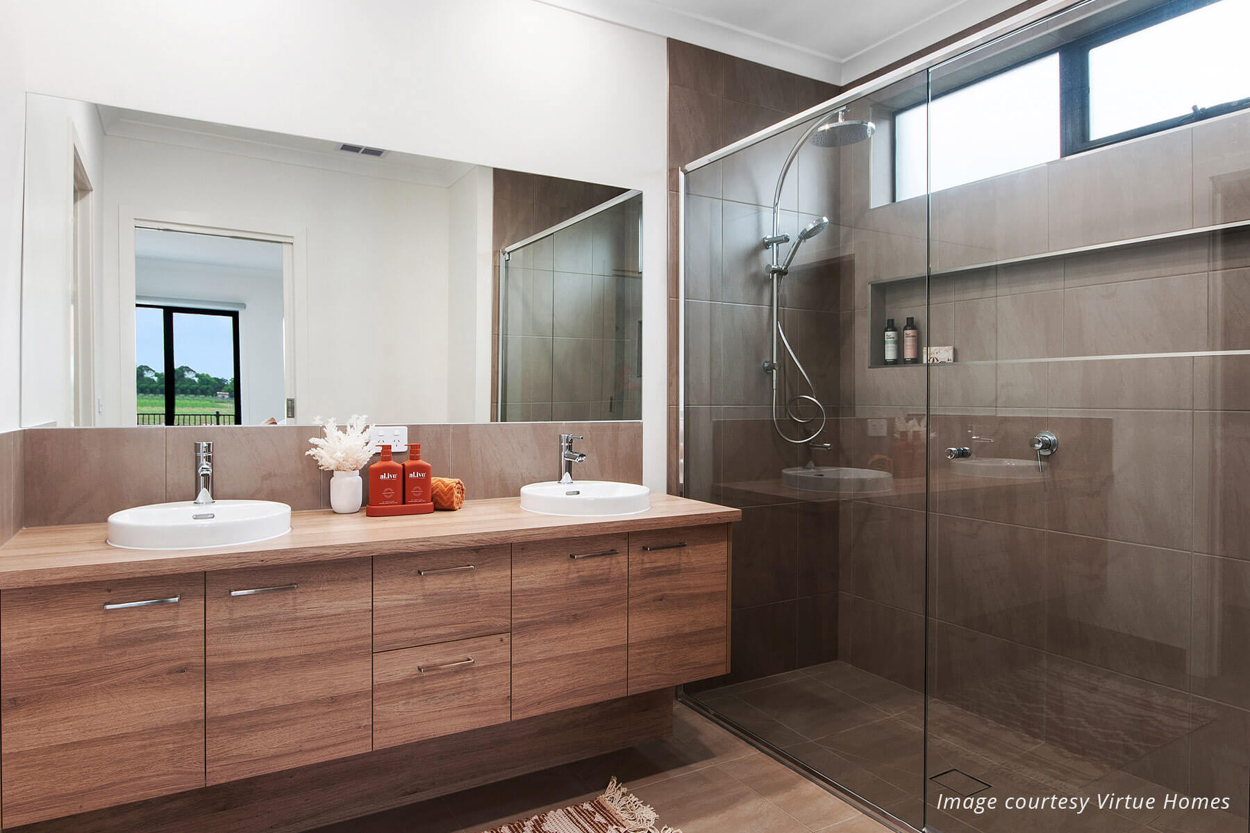 Modern bathroom with timber double vanity and large tiled shower